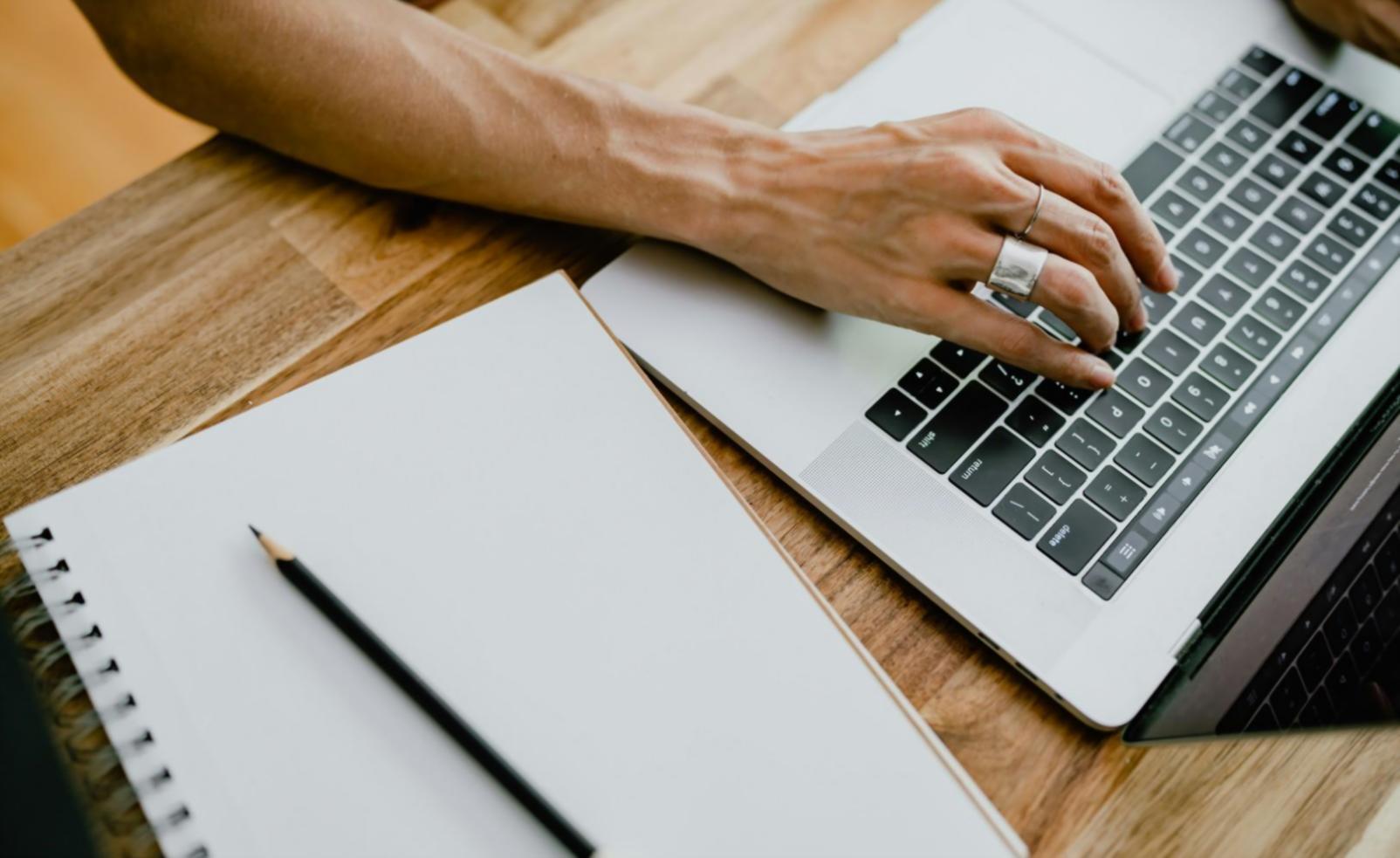 Business owner reviewing financial dashboard on laptop